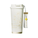 Four-leaf clover design detail on GERM insulated tumbler