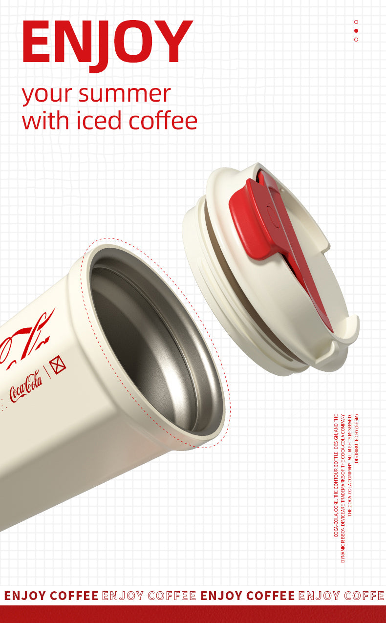 White insulated coffee cup with red lid featuring Coca-Cola branding, promotional text 'Enjoy your summer with iced coffee'.