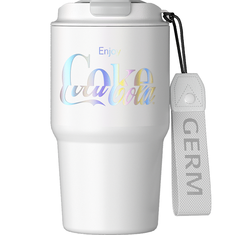 White insulated tumbler with colorful text and a matching strap on a white background