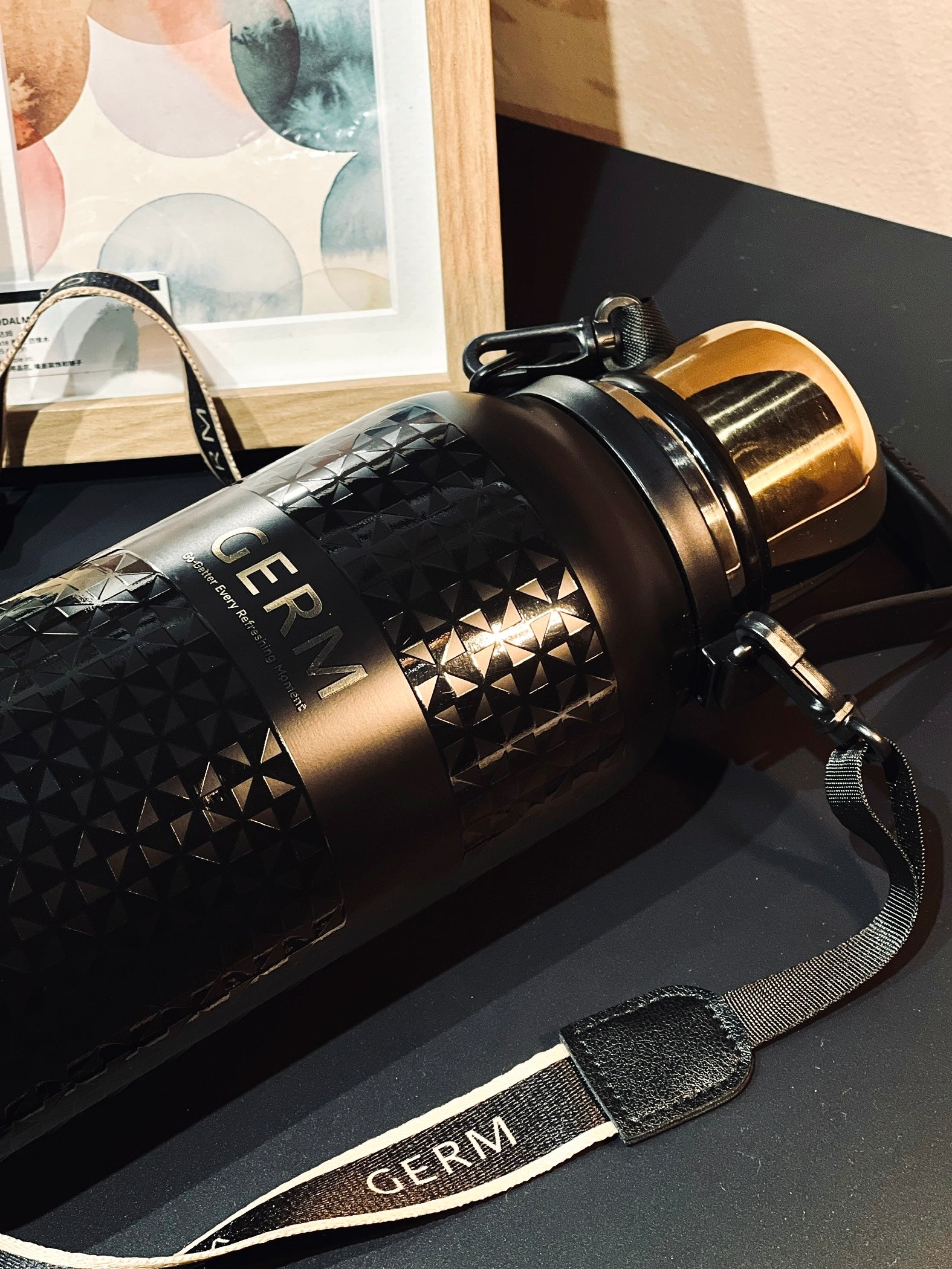 Tea infuser and cup lid detail on GERM GO-GETTER vacuum flask