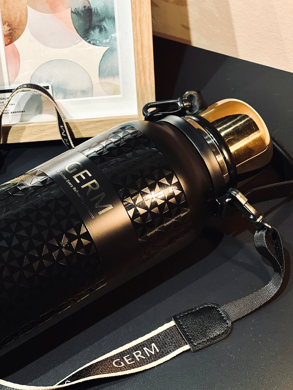 Tea infuser and cup lid detail on GERM GO-GETTER vacuum flask