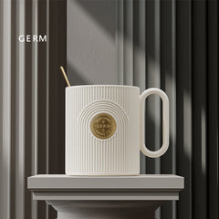 minimalist ceramic coffee mug with handle and lid