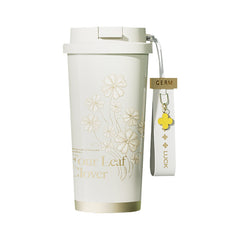 Four-leaf clover design detail on GERM insulated tumbler