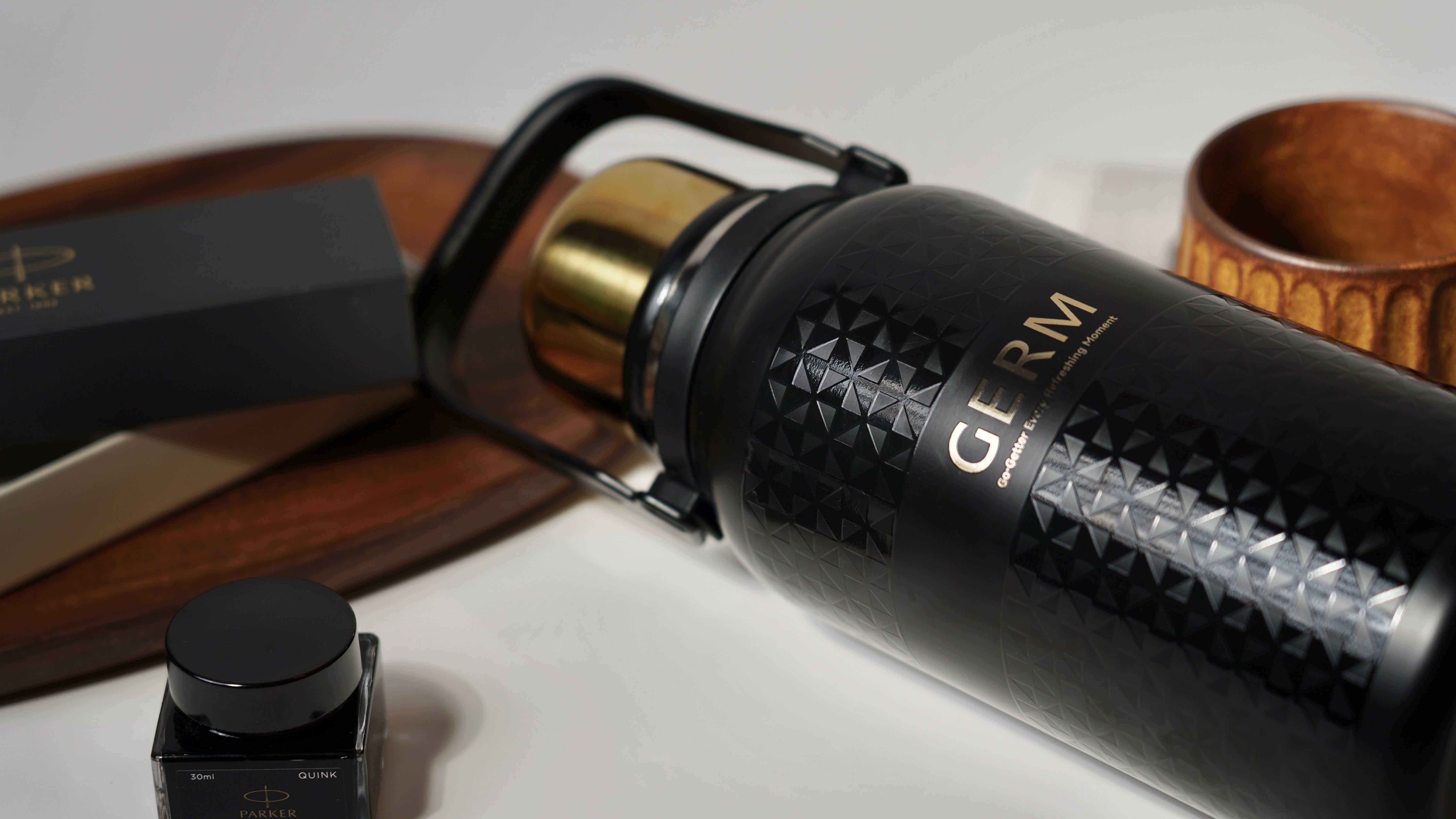 Tea infuser and cup lid detail on GERM GO-GETTER vacuum flask