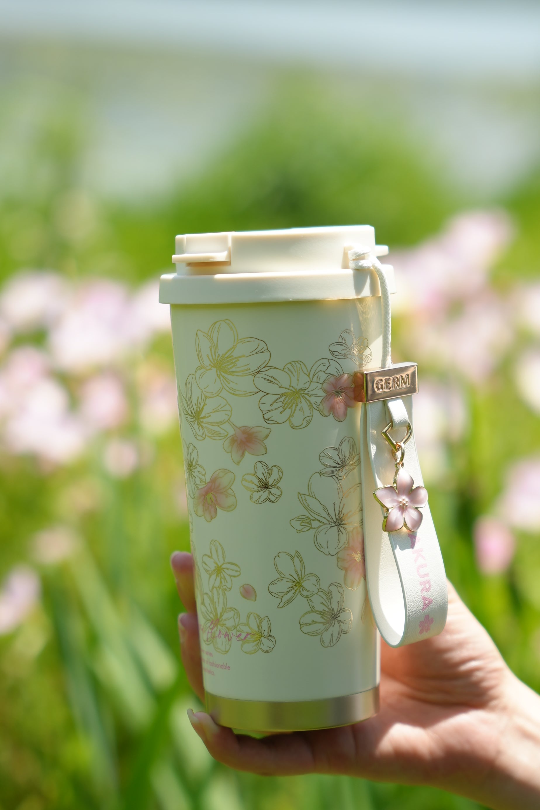 Sakura floral design detail on GERM vacuum insulated tumbler