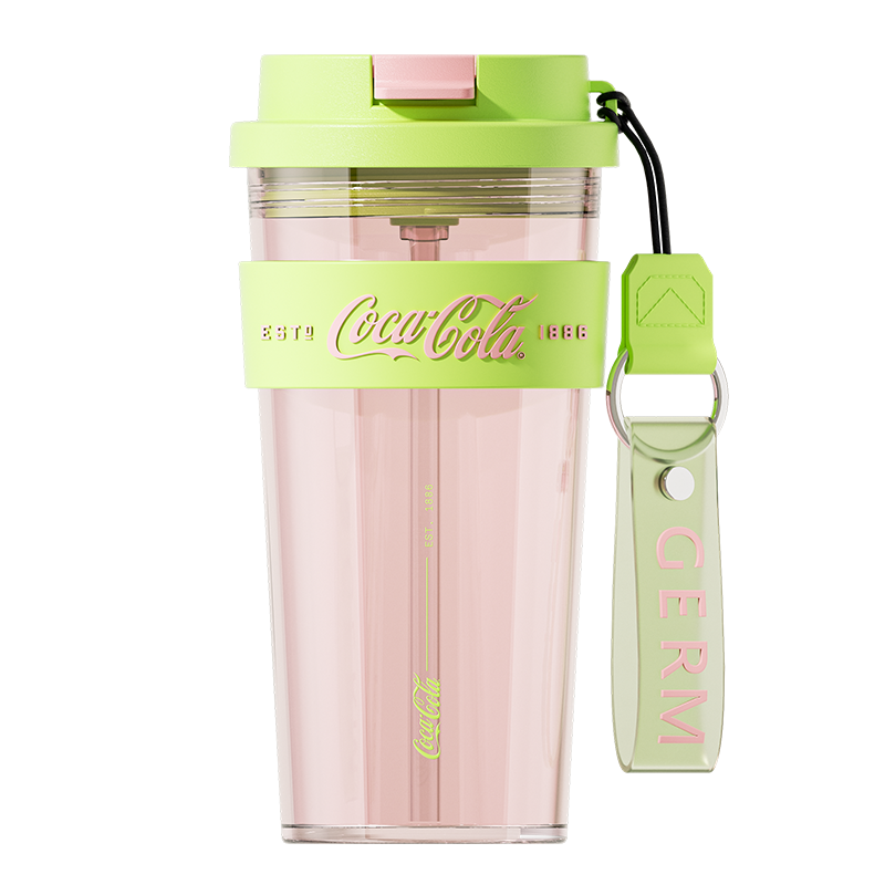 Pink tumbler with green lid and strap featuring Coca-Cola branding on a white background
